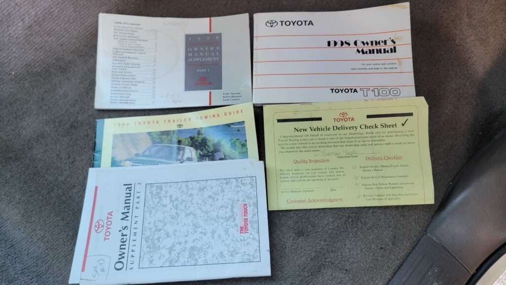 Original owner’s manual and documents for 1998 Toyota T100 DX 4x4