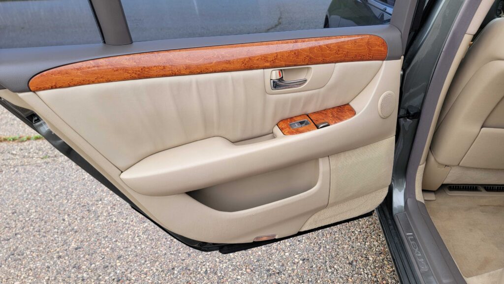 Rear driver door panel and trim details of 2005 Lexus LS430