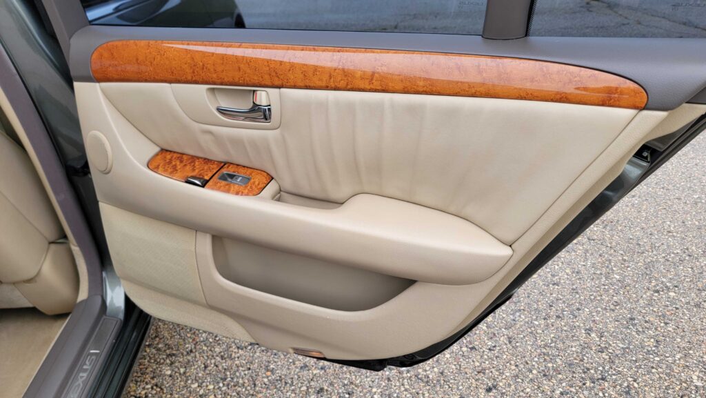 Rear passenger door panel and controls of 2005 Lexus LS430