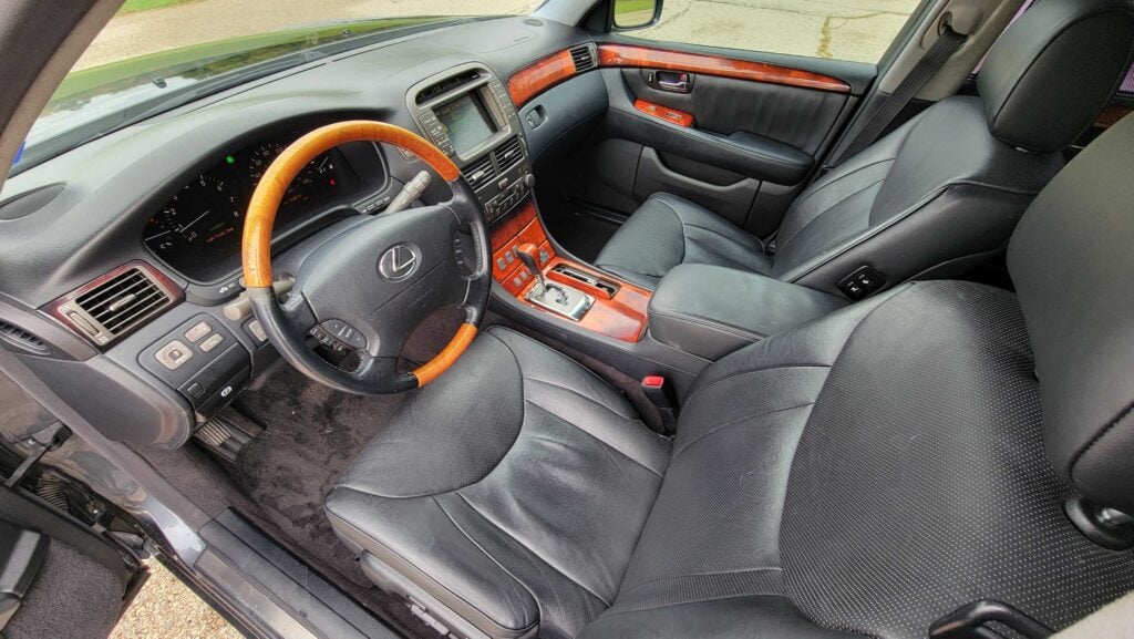Cockpit view of 2006 Lexus LS430 ULTRA showing steering wheel and instrument cluster
