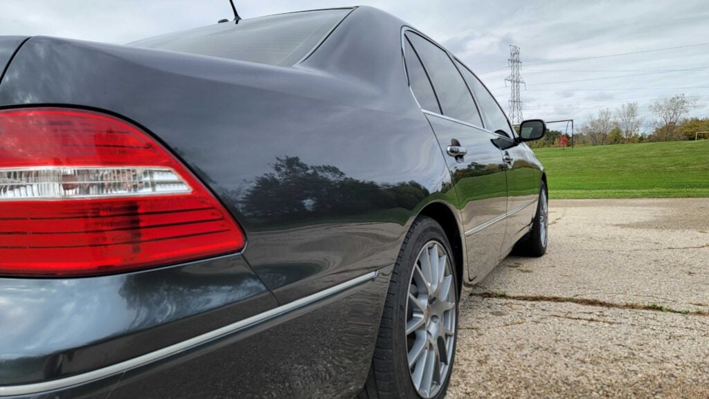 Close-up of rear passenger-side panel and wheel of 2006 Lexus LS430 ULTRA