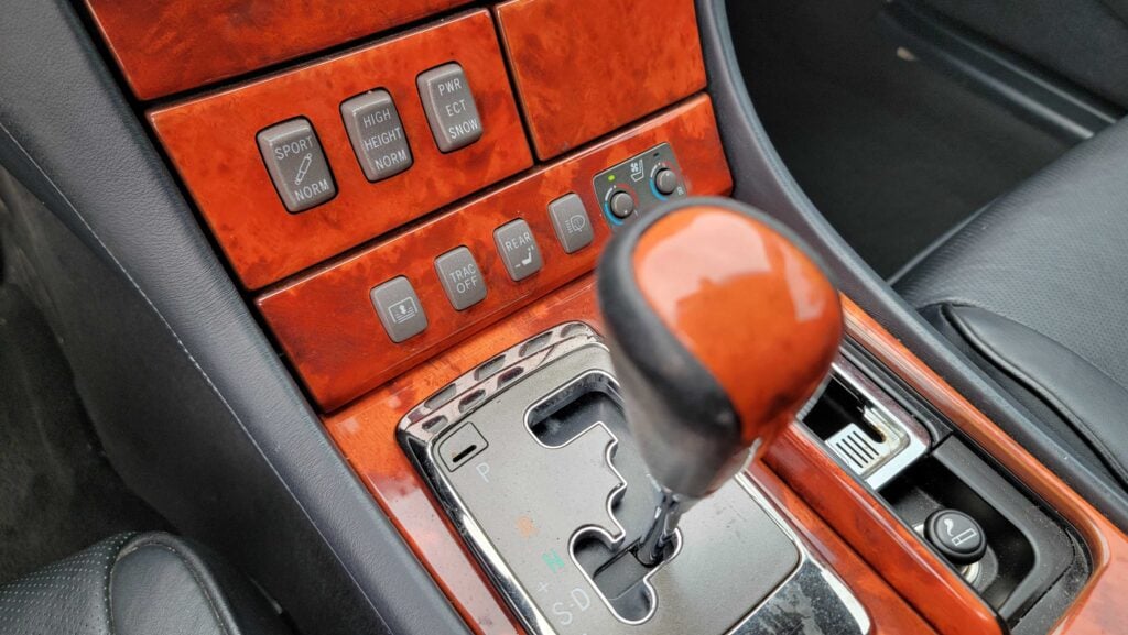Shifter and center console view of 2006 Lexus LS430 ULTRA with woodgrain trim