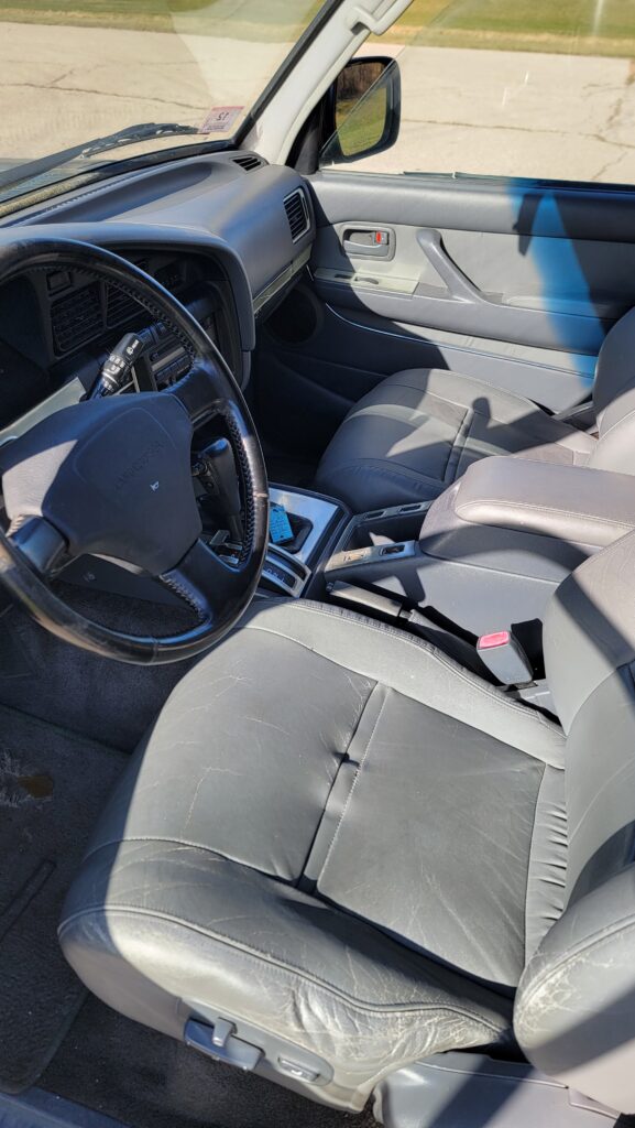 Driver seat and steering wheel of 1994 Toyota Land Cruiser triple locked