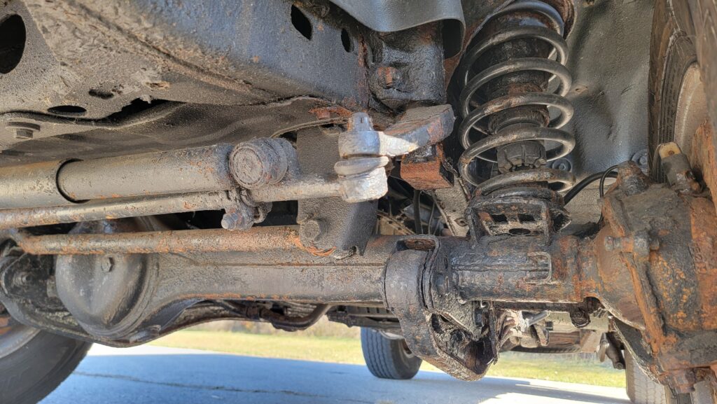 Front suspension close-up of 1994 Toyota Land Cruiser green triple locked