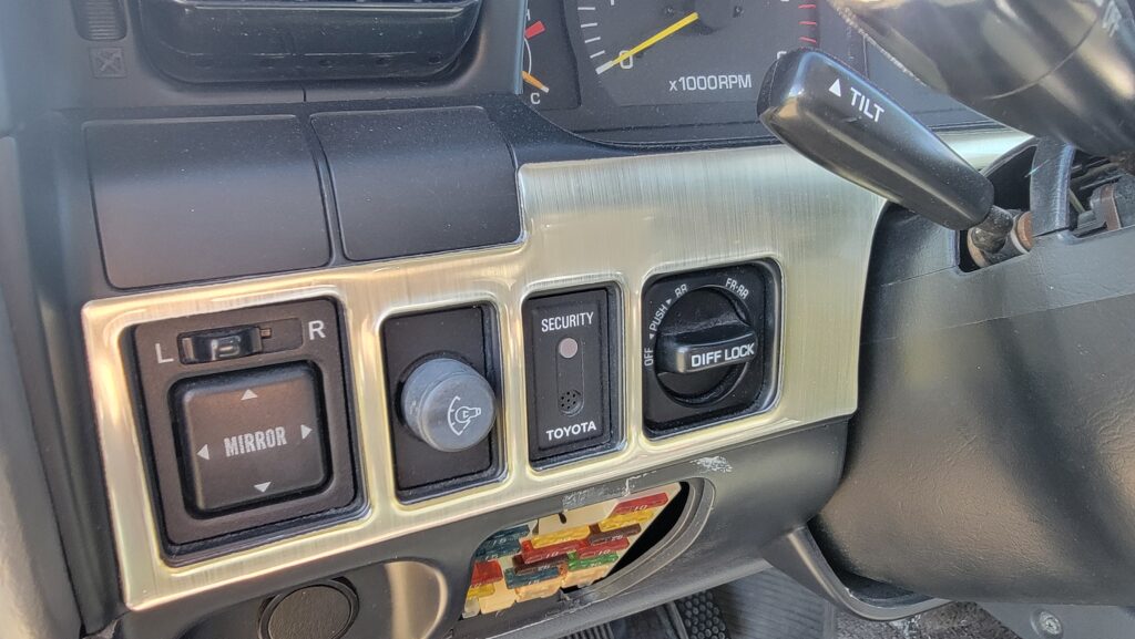 Factory triple locker switch panel of 1994 Toyota Land Cruiser