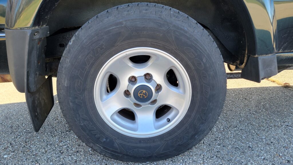 Rear passenger wheel closeup on 1994 Toyota Land Cruiser triple locked