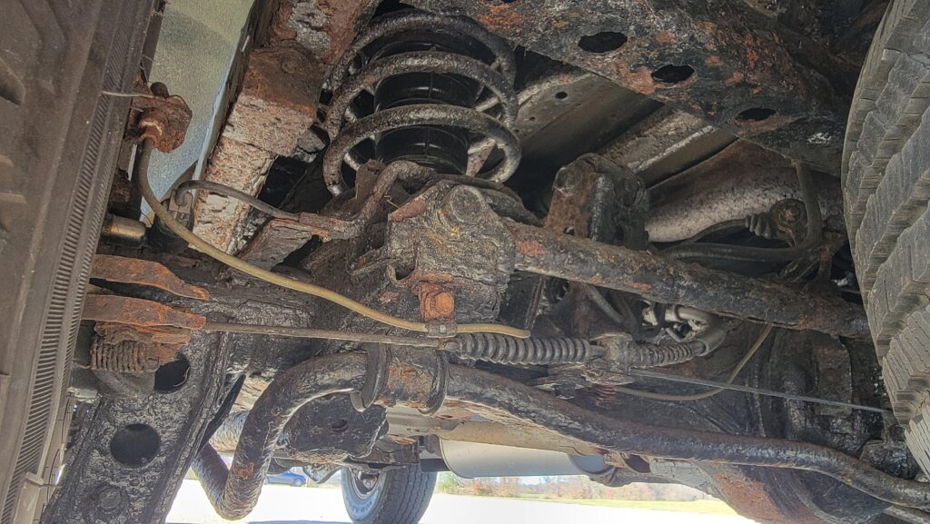 Underbody crossmember on 1994 Toyota Land Cruiser green triple locked