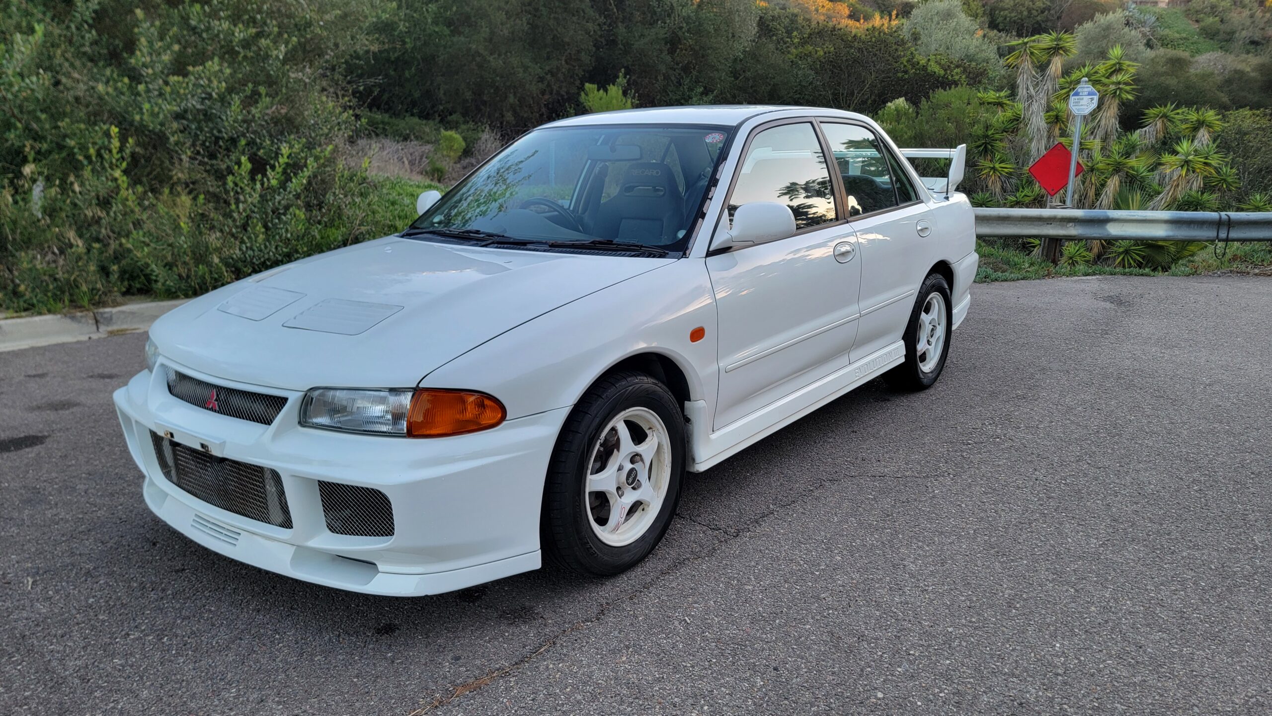 1995 Mitsubishi Evo 3 front passenger-side angle - close up