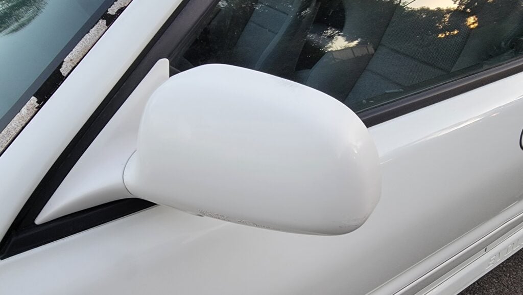 Passenger-side mirror and door close-up