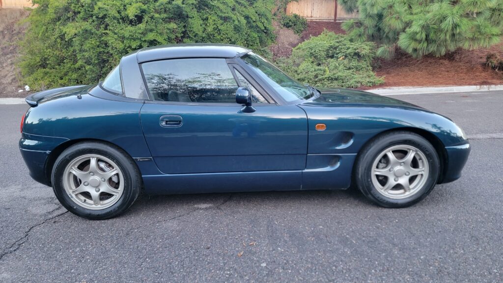 Driver-side Low exterior view of 1996 Suzuki Cappuccino