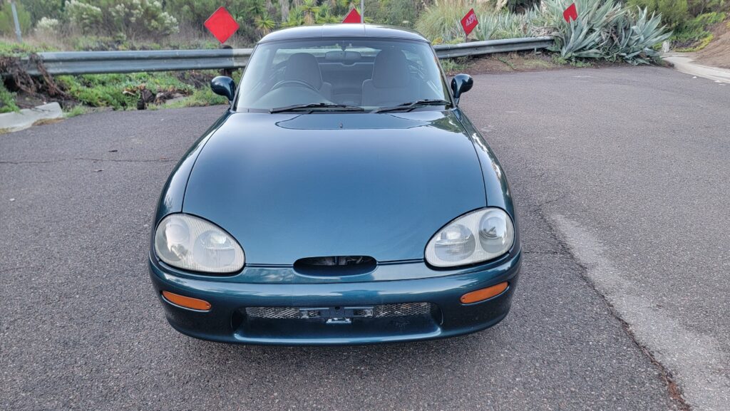 1996 Suzuki Cappuccino front view in dark green