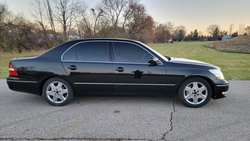 Passenger side profile of black 2004 Lexus LS430