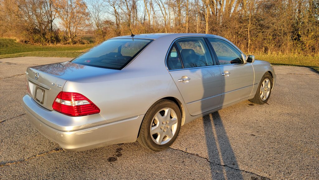 Passenger-side rear quarter angle of silver 2004 Lexus LS430