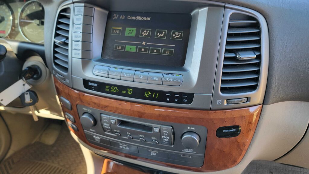 Factory stereo and climate controls – 2006 Lexus LX470 Sand Dollar Pearl