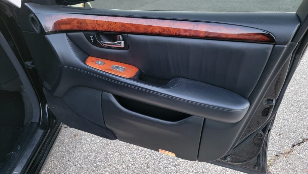 Passenger side front door panel with wood trim in Lexus LS430