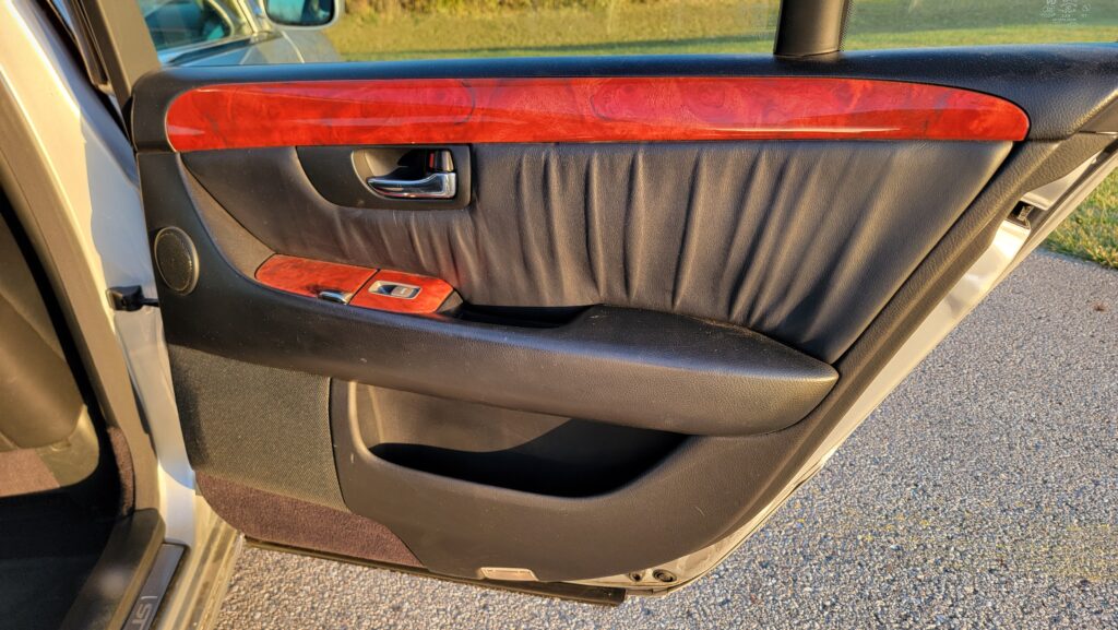 Passenger rear door interior panel with wood trim on Lexus LS430