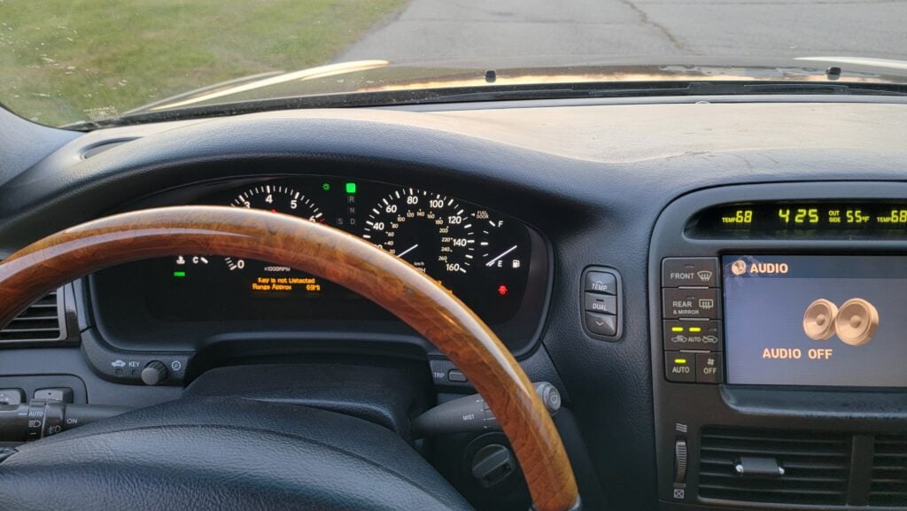 Full dashboard, steering wheel, and center console of Lexus LS430 Ultra Luxury