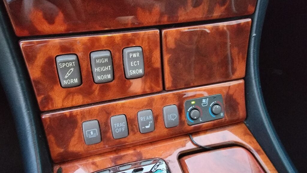 Ultra Luxury rear seat control panel in Lexus LS430 with wood trim