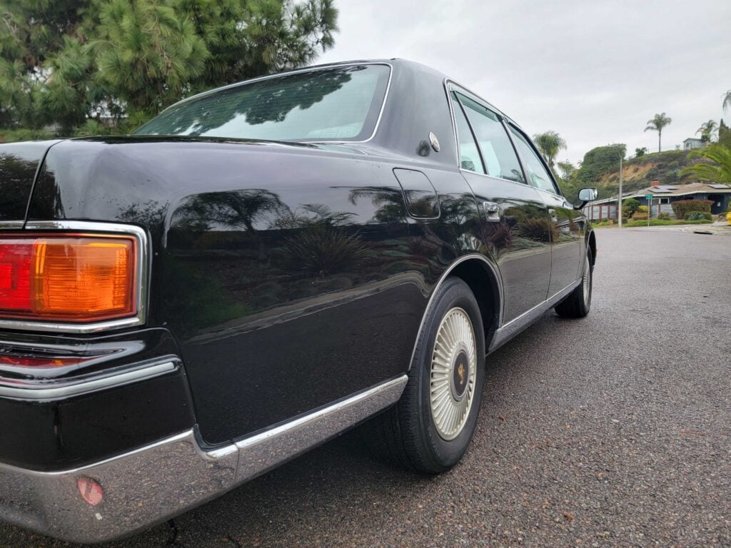 Rear driver-side angle close up of right-hand drive Toyota Century