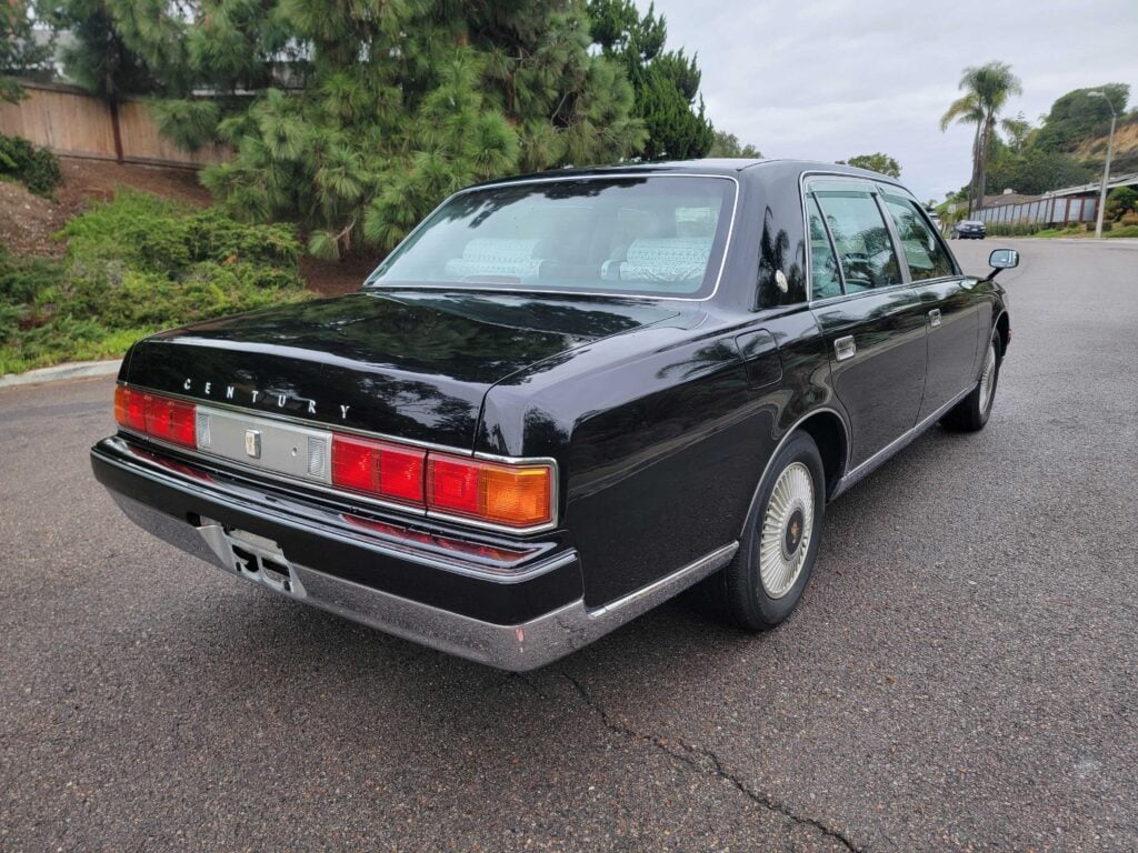 Rear driver-side angle of right-hand drive 1998 Toyota Century