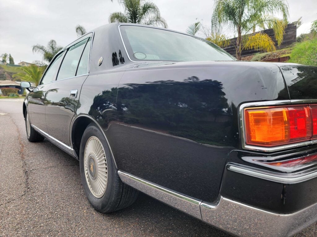 Rear passenger-side angle close up of right-hand drive Toyota Century