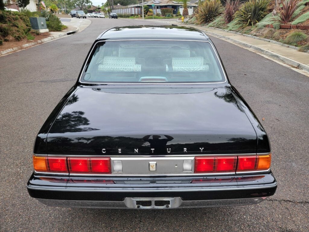 Straight rear view of 1998 Toyota Century in black