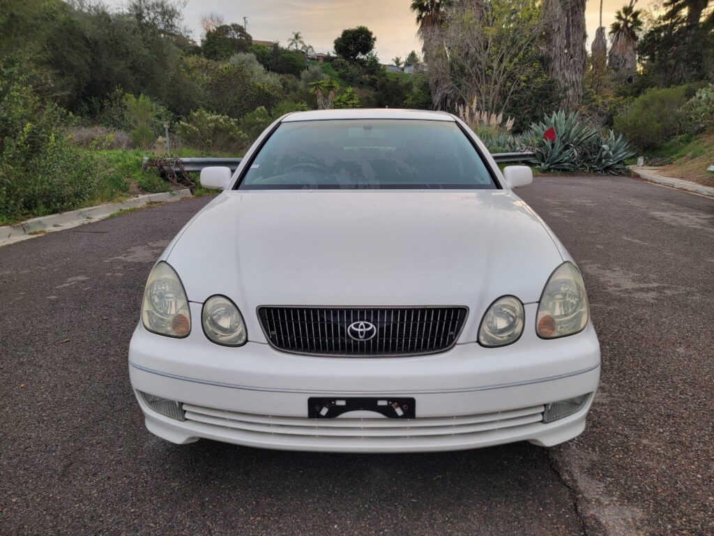 Straight front view of 1999 Toyota Aristo in white