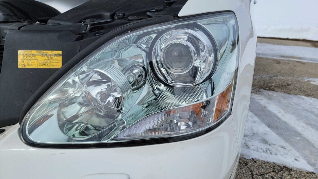 Driver-side headlight close-up of 2005 LS430