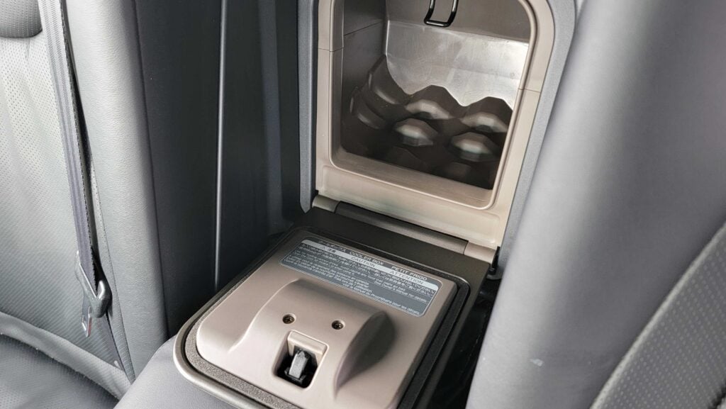 Rear cooler box and storage area