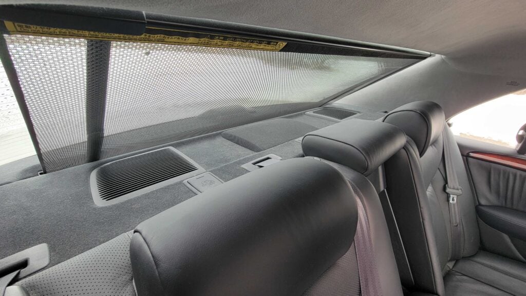 Rear headrests and powered rear sunshade