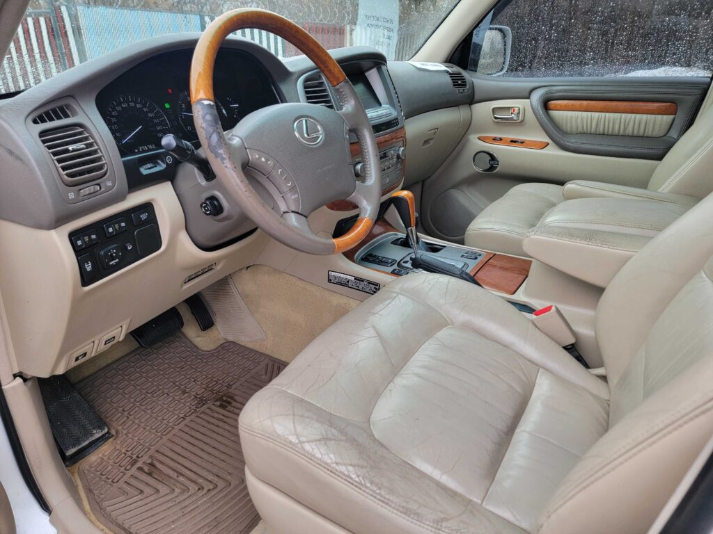 Front cabin interior with leather and wood trim