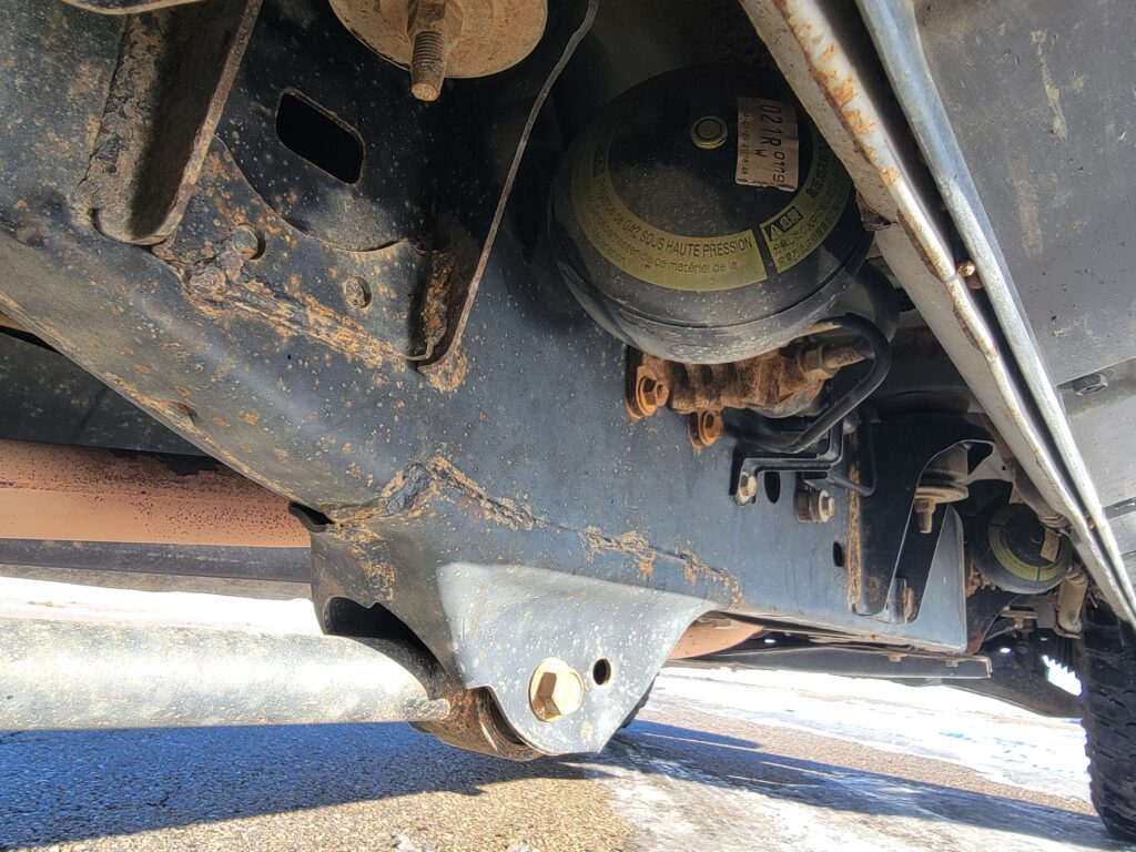 Frame rail condition close-up under Lexus LX470