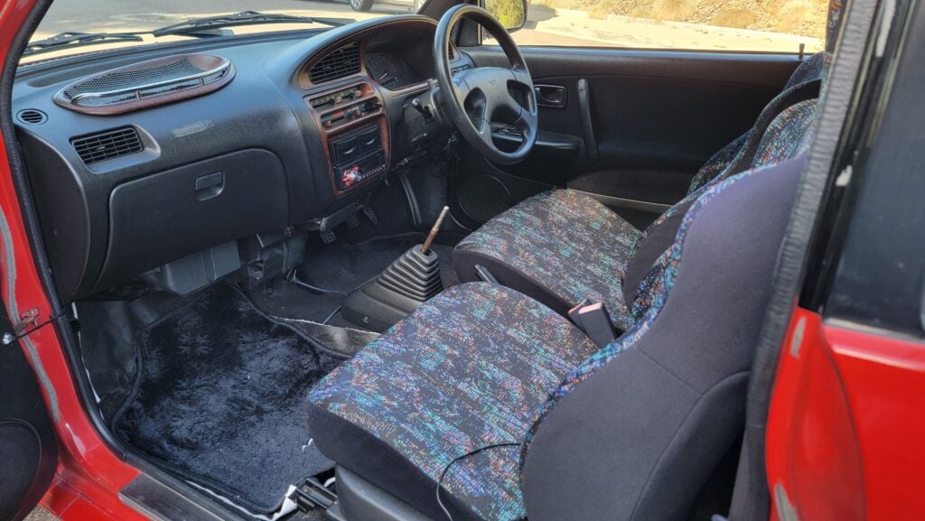 1997 Daihatsu Mira TR-XX passenger entry view