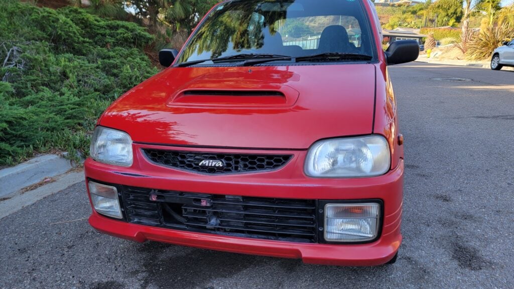 1997 Daihatsu Mira TR-XX passenger side front bumper and hood