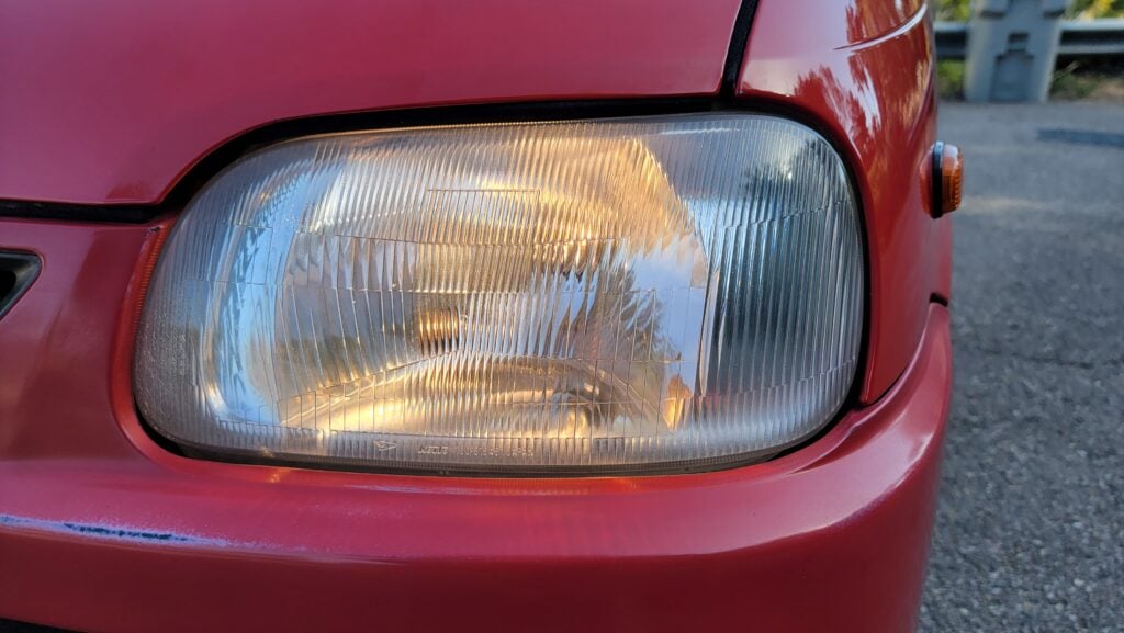 1997 Daihatsu Mira TR-XX passenger headlight on