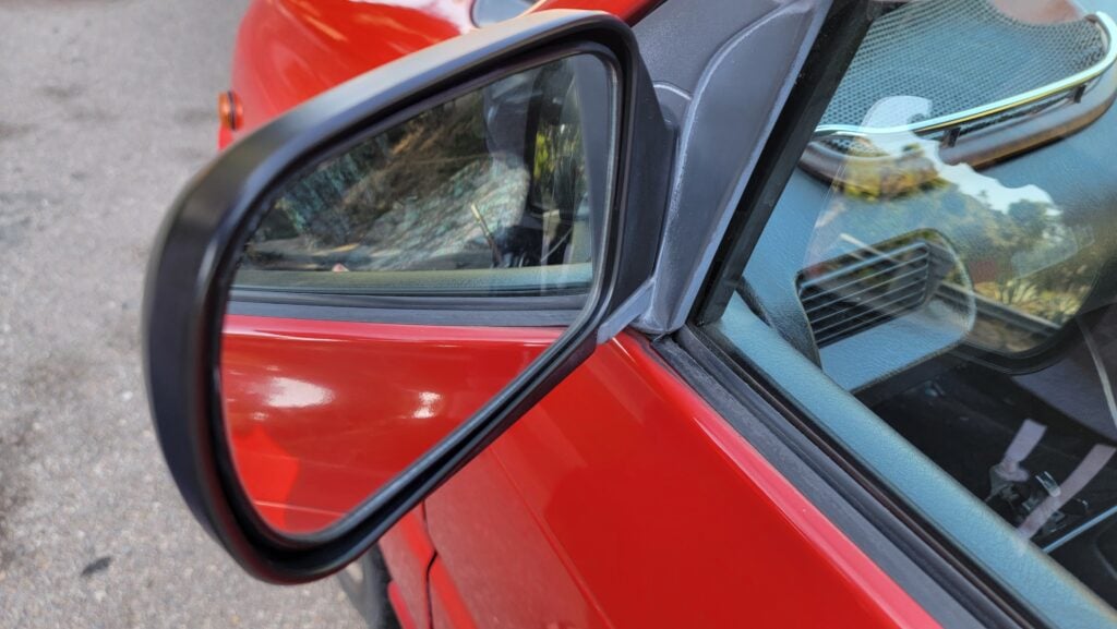 1997 Daihatsu Mira TR-XX passenger side mirror back view