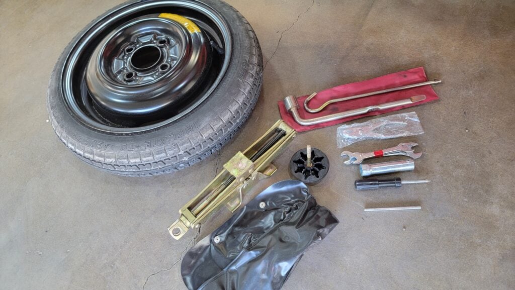 1997 Daihatsu Mira TR-XX spare tire and tools