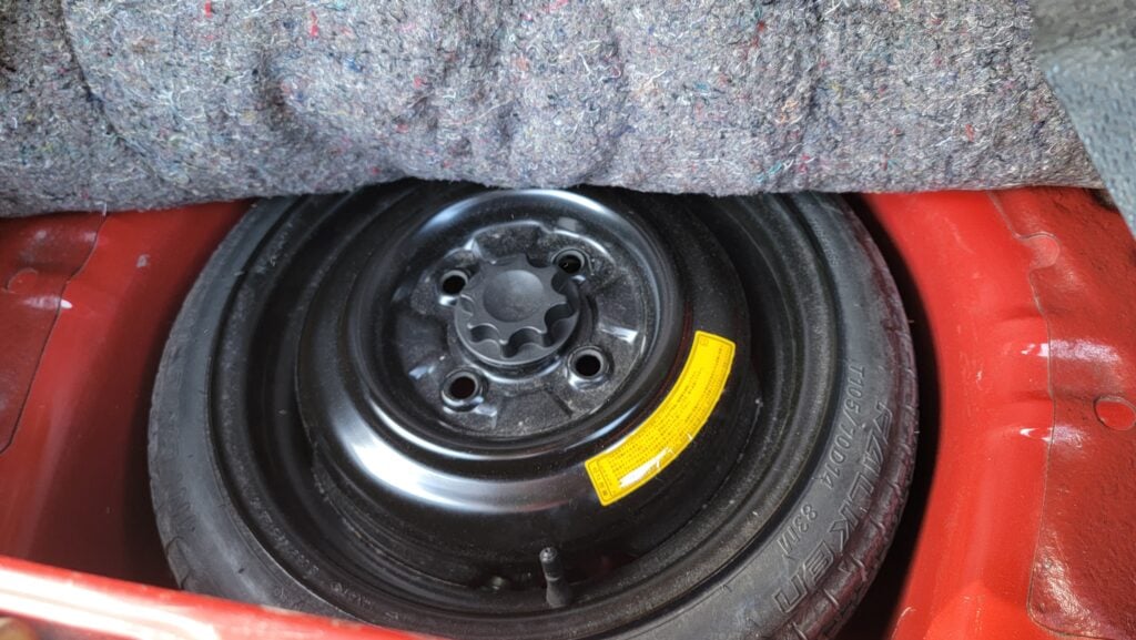 1997 Daihatsu Mira TR-XX spare tire well