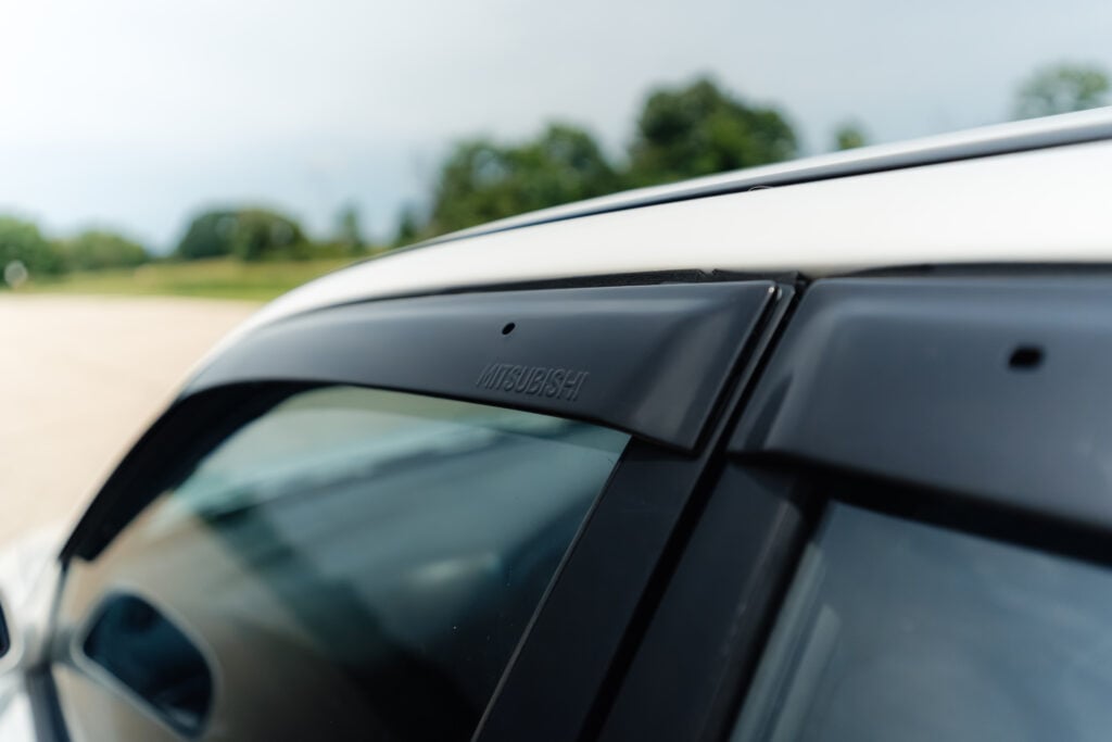1995 Mitsubishi EVO 3 passenger rain visor view