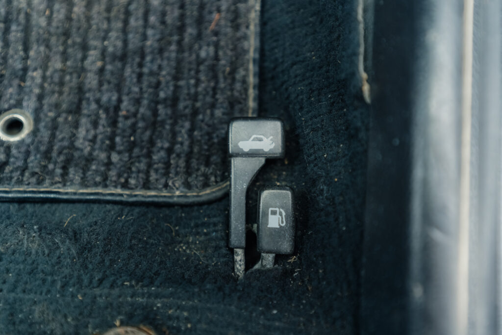 1995 Mitsubishi EVO 3 trunk and gas door release knobs