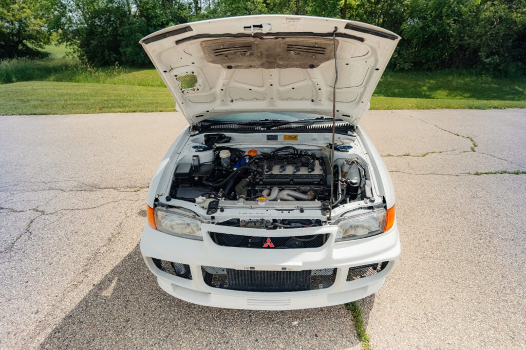 1995 Mitsubishi EVO 3 front view hood up overhead