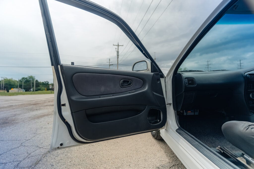 1995 Mitsubishi EVO 3 passenger front door open