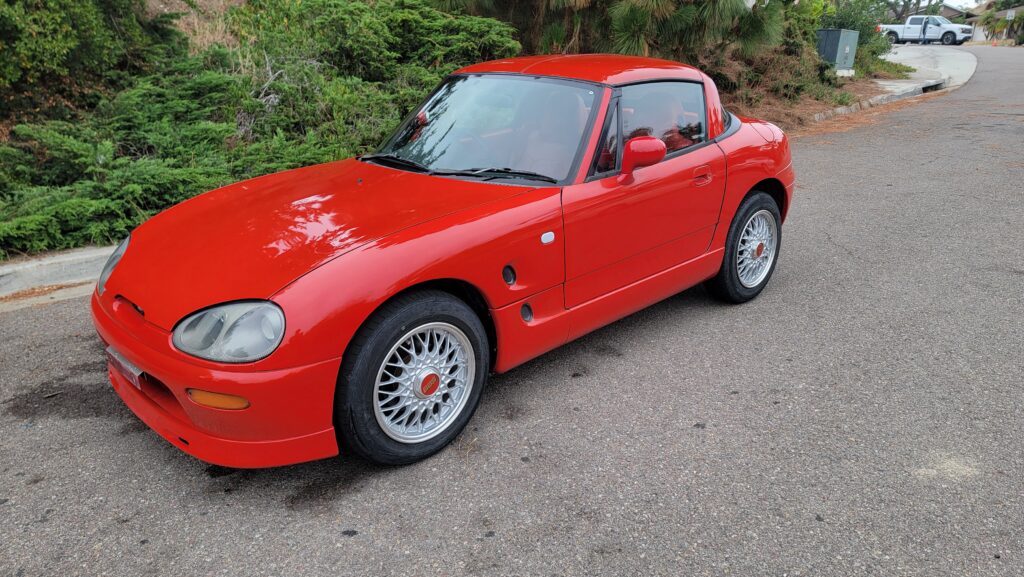 1998 Cappuccino Flash Red Passenger Side front view Top up