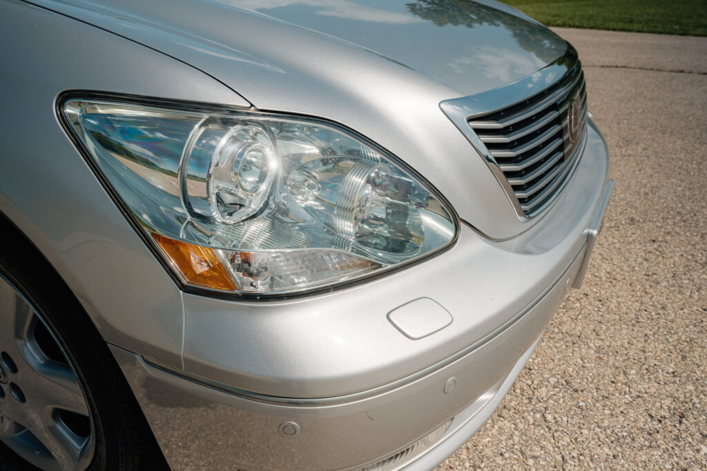 2004 Lexus LS430 CL Silver on Black passenger headlight view near
