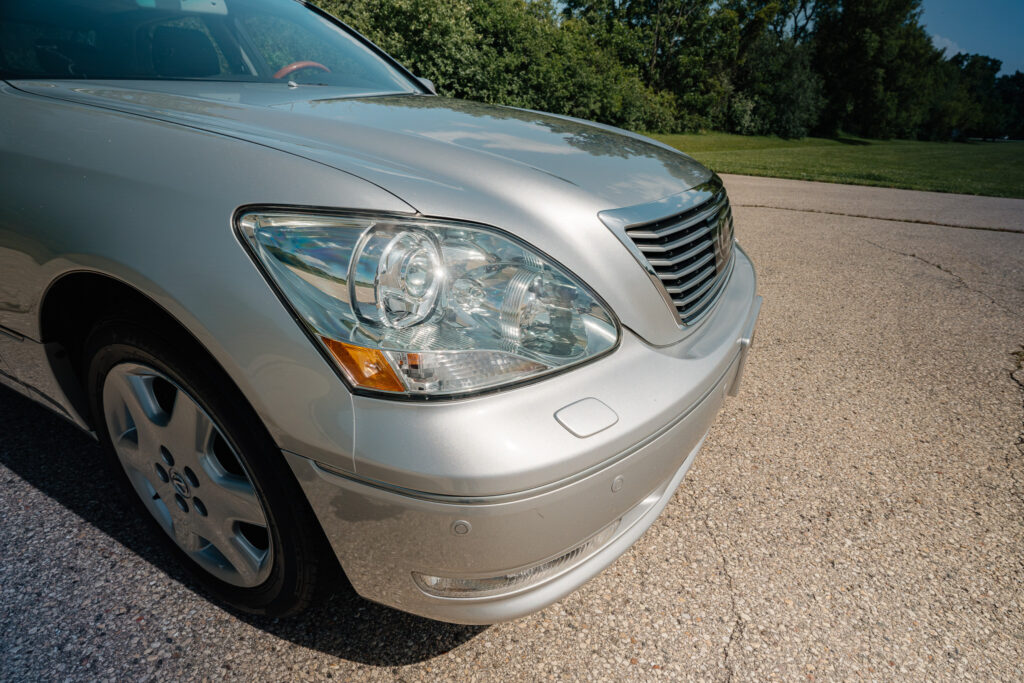 2004 Lexus LS430 CL Silver on Black passenger headlight view
