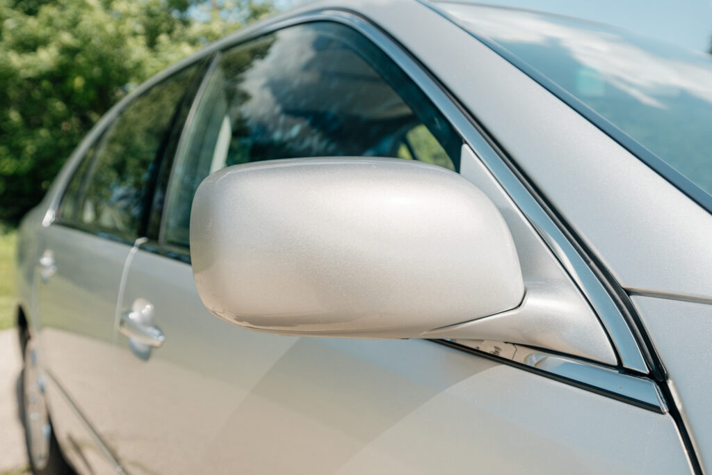 2004 Lexus LS430 CL Silver on Black passenger side mirror front view
