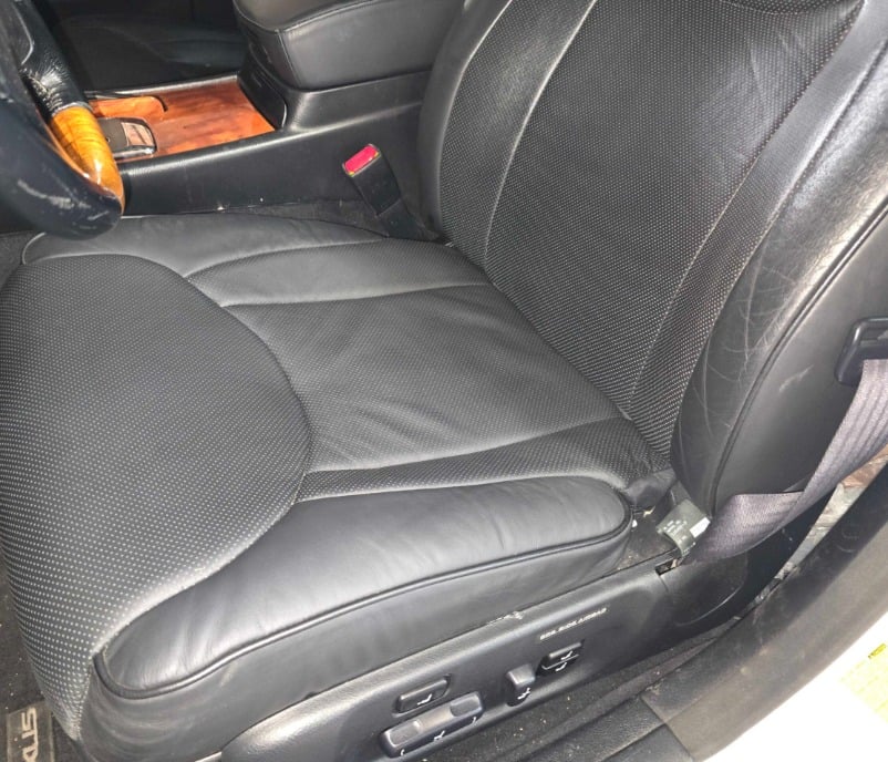 Black leather Lexus LS430 driver seat shown as a refurbished seat upgrade example